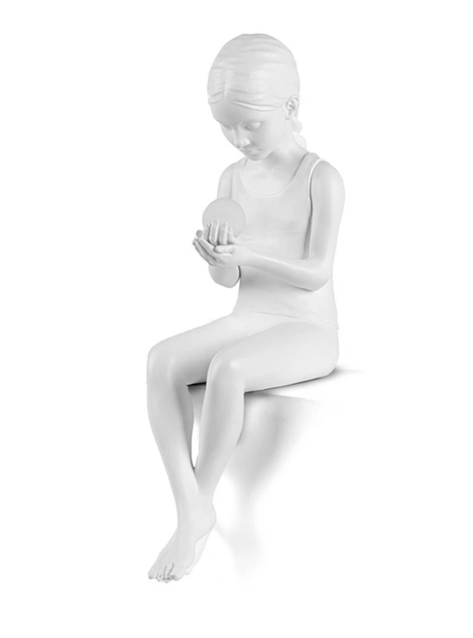 Mainos Valaisinmestari: Innerglow Girl -pöytävalaisin on kuin taideteos. 